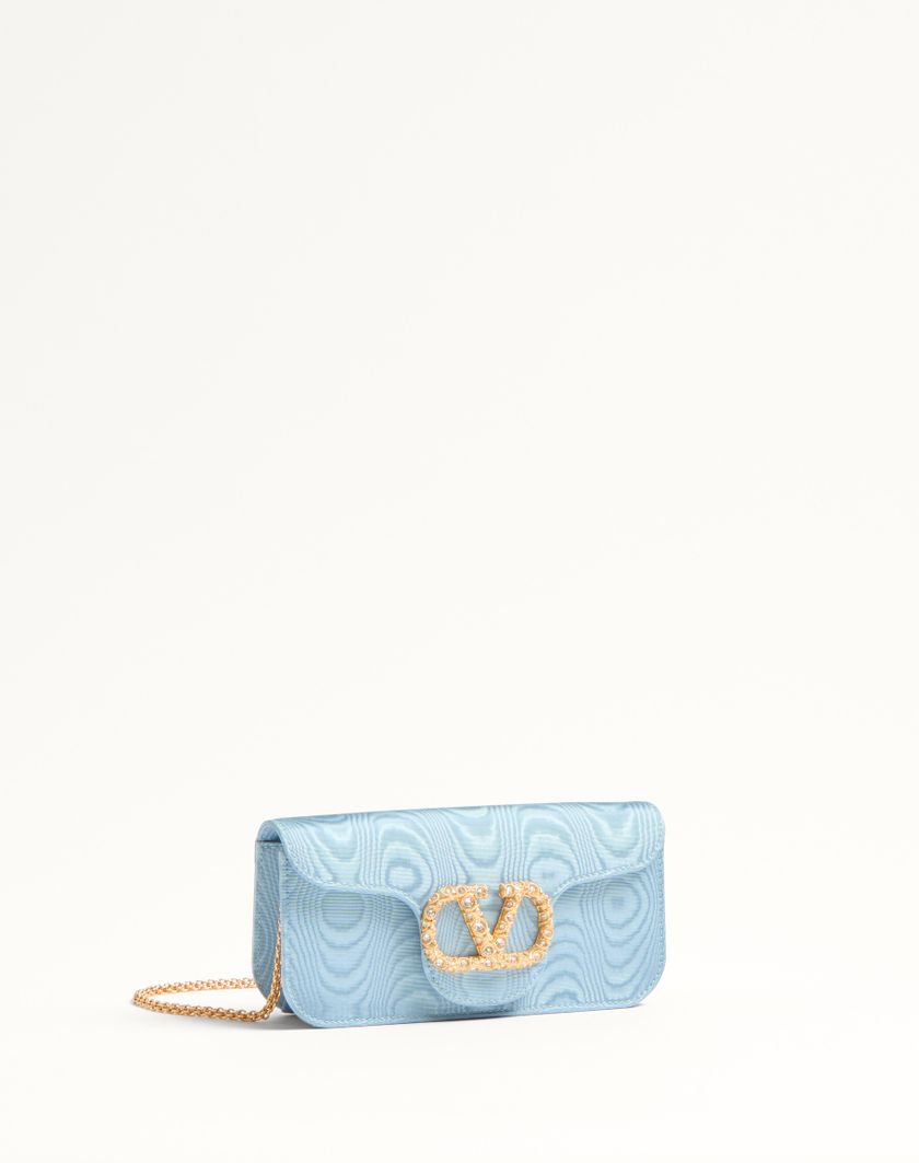 Valentino Handbags Clutch Valentino Garavani Locò In Tessuto Moiré Con Logo Gioiello per Donna in Blu | Valentino IT Negozio