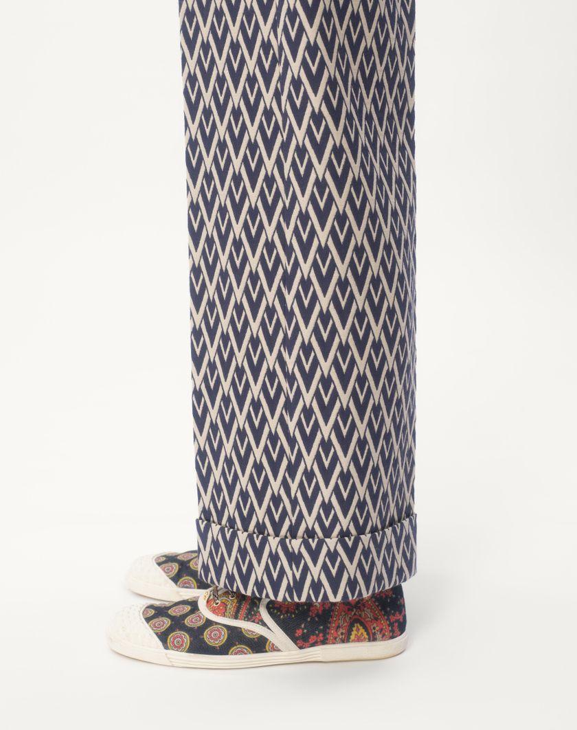 Valentino Handbags Pantalone In Lana Con Risvolto Con Motivo Jacquard Toute La V per Uomo in Notte/crema | Valentino IT Acquista Ora